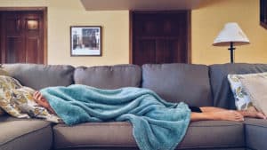 Person Sleeping on Couch