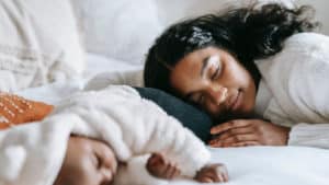 Woman Sleeping with Baby